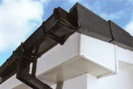 White bullnose fascia with black square rainwater